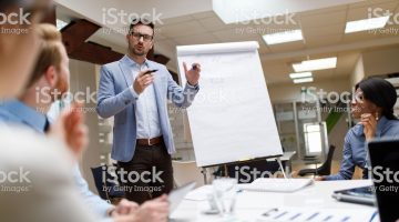 Businessman is presenting new project to partners in the office. Businessman is presenting new project to partners in the office.